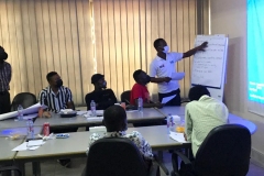Yusif-presenting-to-the-participants-feedback-from-thier-group-discussions-at-the-HIVST-training
